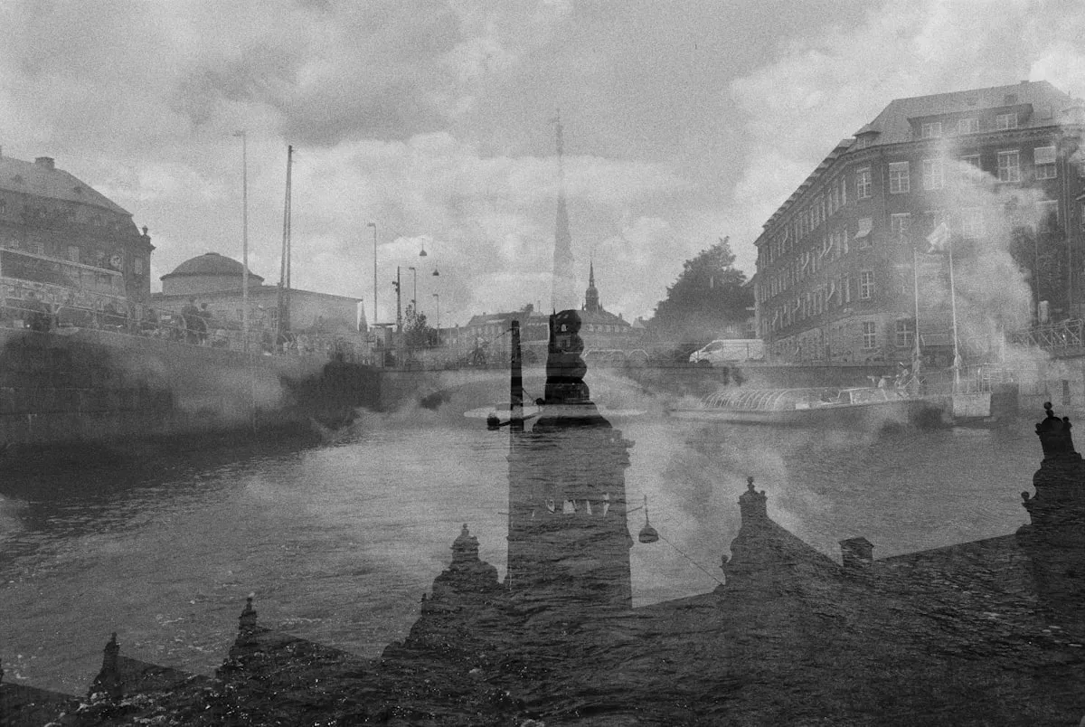 Creative double exposure photograph blending a portrait with nature