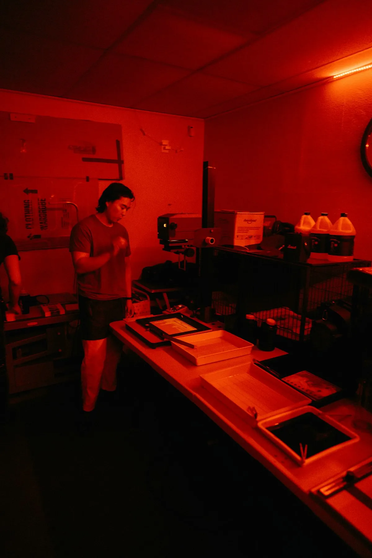 Film developing process in a darkroom with chemicals